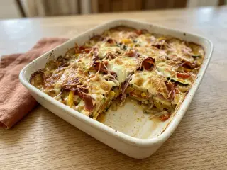 Gratin de légumes méditerranéens, mozzarella et jambon cru au four