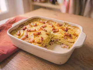 Gratin de pommes de terre, lardons et fromage râpé