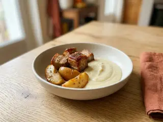 Rôti de porc aux pommes et purée de céleri