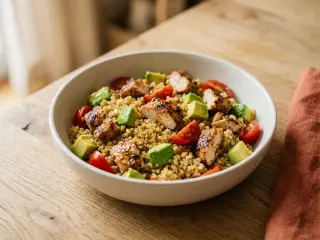 Quinoa salad with grilled chicken, avocado and tomatoes
