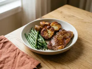 Steak with roasted potatoes and green beans
